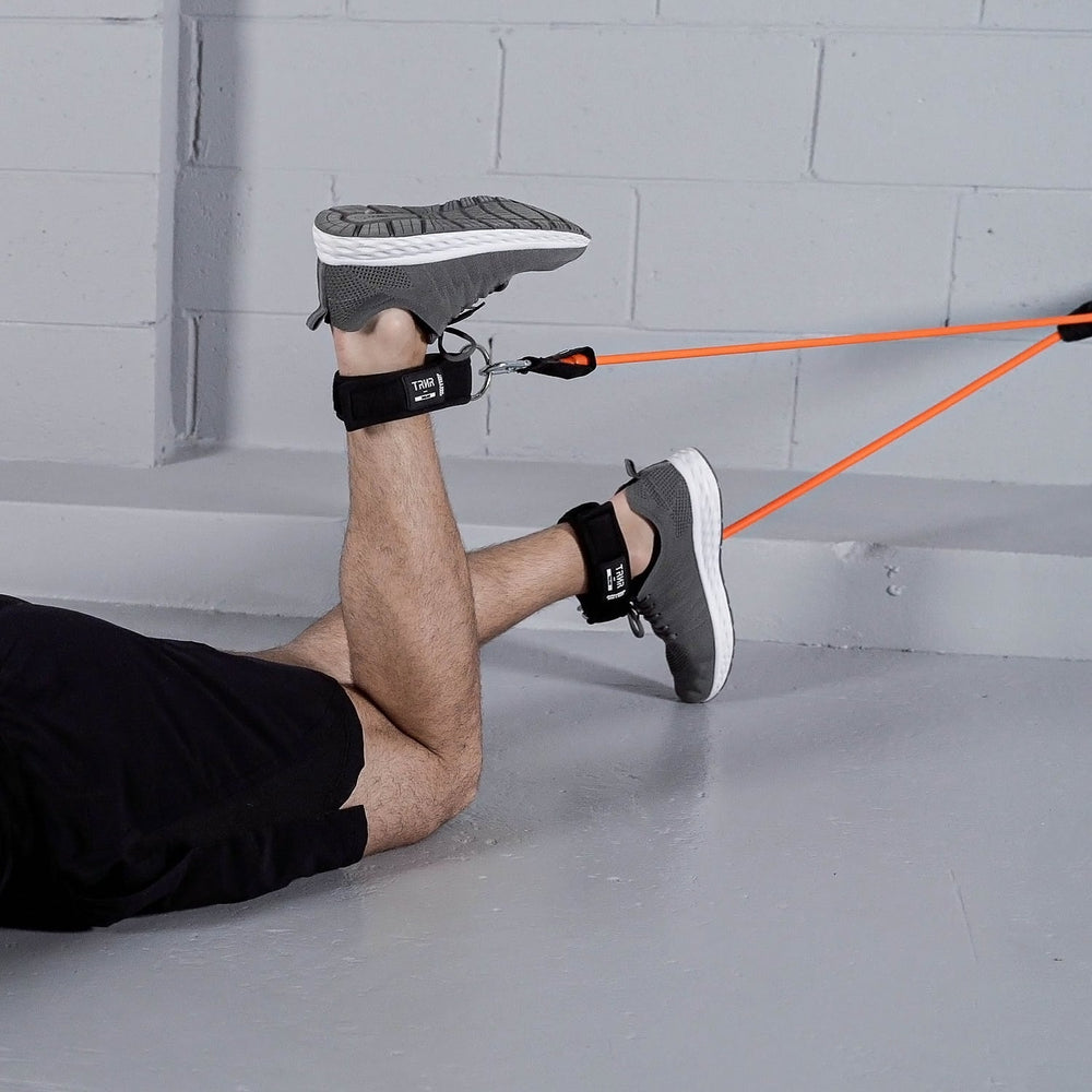 Alternate Leg Lifts Using TRNR Ankle Straps & Strength Tube from the X-Series